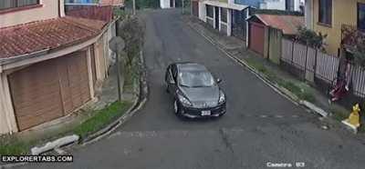 Kid gets his head stuck in a fence after a car tries rolling through a stop sign
