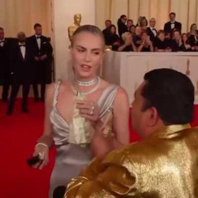 Charlize Theron excited to do a tequila shot at the Oscars