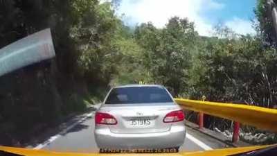 Huge boulder barely misses car during earthquake in eastern Taiwan.