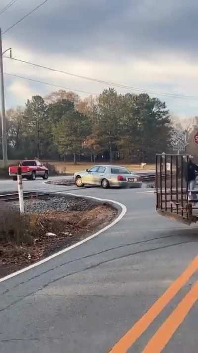 Train slams into car