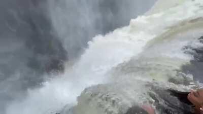 Just learned that standing this close to a 380 feet waterfall is a thing (Devil's pool - Victoria falls )