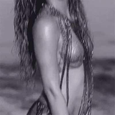 I love Shakira's naughty look as she bounces her fat ass