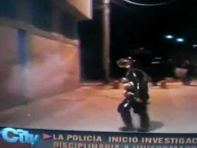 Pushing a cop in full riot gear