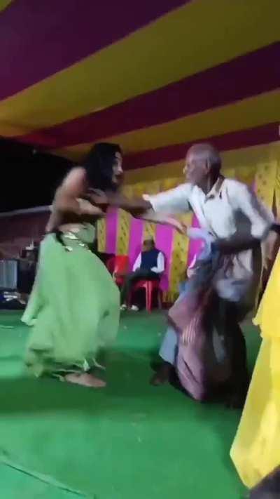 Women hired to dance at a wedding force themselves on this man and attempt to strip him. 