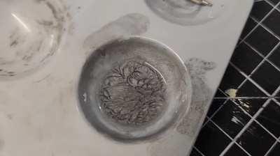 The tip of my silver Sharpie paint marker became encrusted with dried paint, so I put it in some Acetone... this may be how you summon a demon.