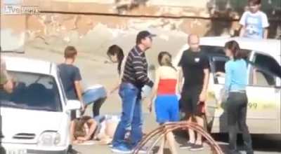 Russian Woman Repeatedly Whacks a Woman with a Tire Iron