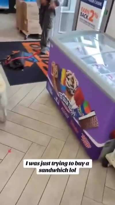 Man trying to buy sandwich almost attacked by dog after owner unleashed it telling it to attack the store clerk. 