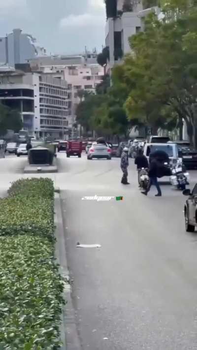 Soldier Clings to Roof After Being Hit by a Car in Chaotic Street Scene