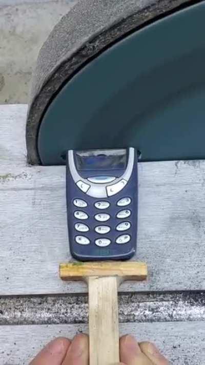 Grinding down a Nokia phone