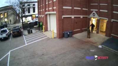Police encounter caught on building surveillance.