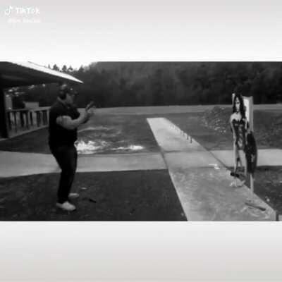 Big man gunning down wonder woman like he's john wick. Only missing his beard.