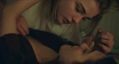 Chloe Moretz putting her full lips to use on another girl