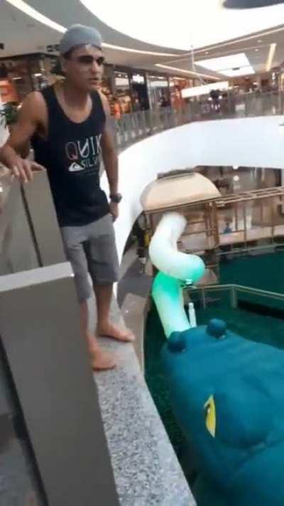 Jumping onto a inflatable Crocodile