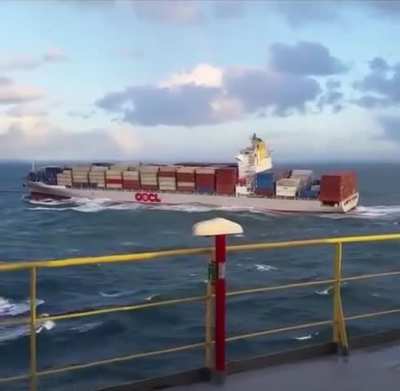 Container ship battling the waves