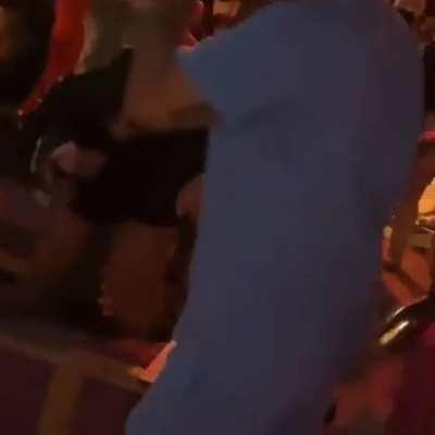 Man gets knocked out into a pool then a brawl breaks out