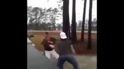 Road rager instigates a 2v1 fight and promptly gets destroyed. Then pulls out a handgun as the people he attacked are walking away