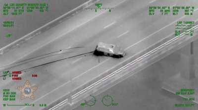 Driver Jumps off bridge in Florida after crashing car in high-speed chase.