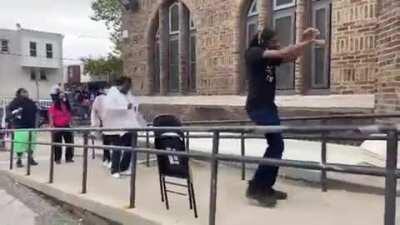 Dancing in the voting line to pass the time.