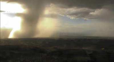 Microburst dumping thousands of gallons of rain on a city at once