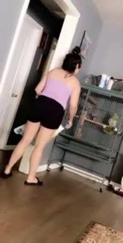 Woman arguing with her parrot.