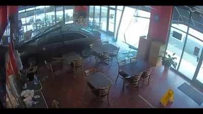 Car crashes into restaurant