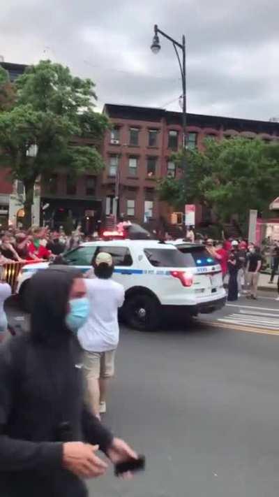 NYPD drives through barricade and protesters