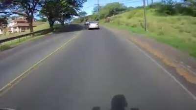 Woman doesn't stop, cuts biker off and...