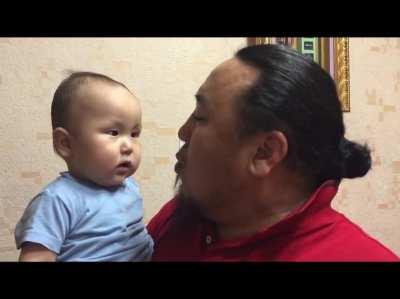 Mongolian singer Batzorig Vaanchig with his son.