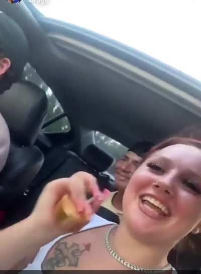 Idiot flashing a gun and using it as a dance prop in a moving car filled with people