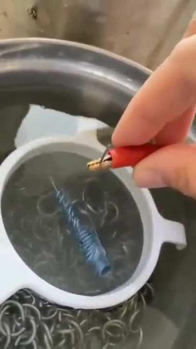 Facinating metal rings change multiple colours.