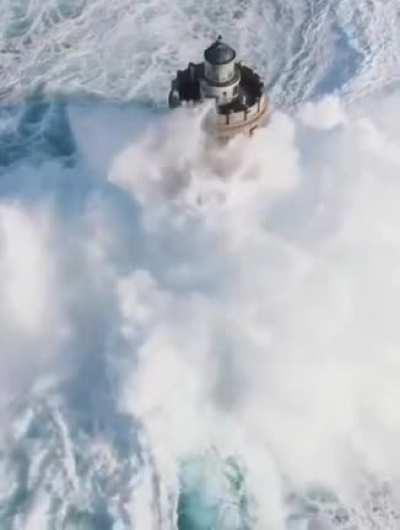 The size of the waves crashing against this lighthouse.