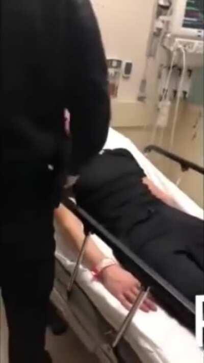 Cop assaults a suicidal man in hospital bed while his donut partner films it