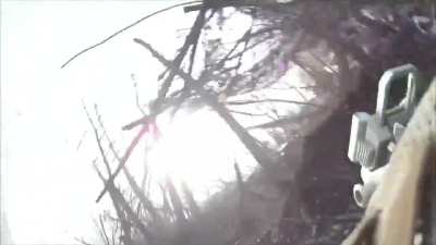 Memberes of the Ukrainian International Legion come under attack by a russian FPV drone which misses.