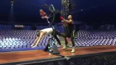 Practice routine for gymnasts at a circus.