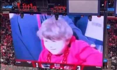 Fans at Game Cheered every time this kid came on the screen and booed when it went on someone else.