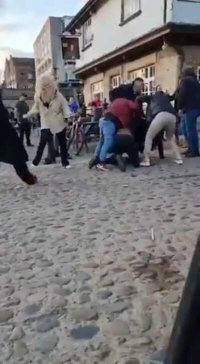 Group of women settle things the old fashioned way.