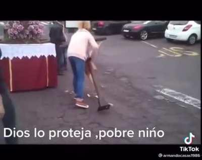 Child is hit by the cross