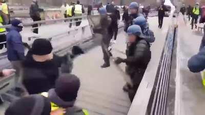 Former French boxing champion Christophe Dettinger taking on riot police