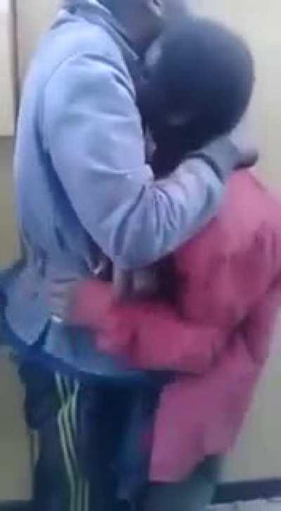 Thieves caught stealing forced to kiss each other