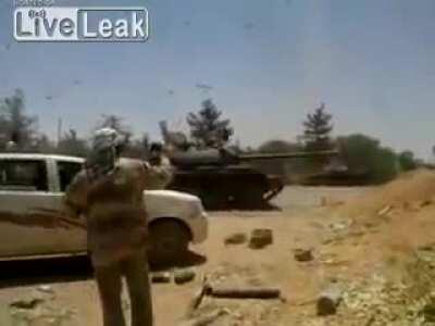 Libyan Rebel Ejected From Tank Like a Rag Doll After a Breech Explosion