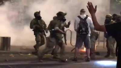 Federal officers strike protester with baton, use pepper spray and tear gas in Portland