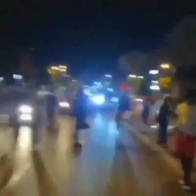 Dude protesting with a chainsaw