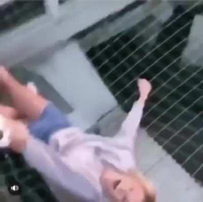 Hanging from the roof for social media attention