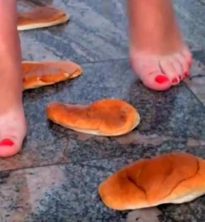 Bread crush under my bare soles... who wants a taste? 🍞👣😈