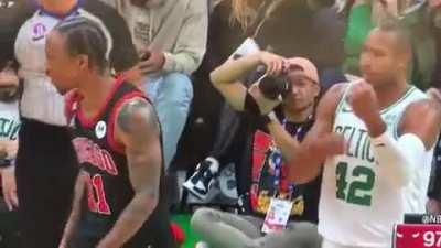 Horford hits Derozan with the violin while he whines to the ref