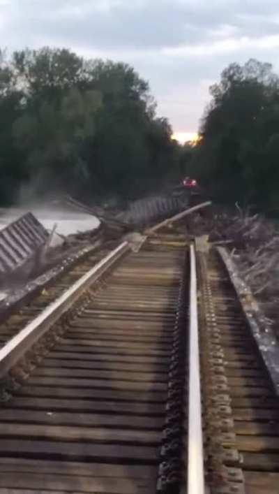 The moment a railway bridge gets washed away by a flooded river (Brunnswick, MO). October 2nd 2020