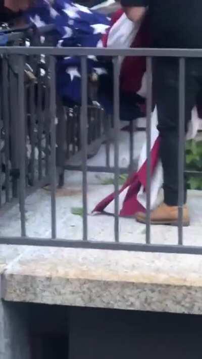 You just love to see it. American flag in front of Trump tower was cut down and throwed in to the river in Chicago.