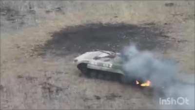 UA POV Russian BMP-1 is hit by an ATGM and the crew bails. Later, a drone drops a grenade into the hatch and sets it on fire.