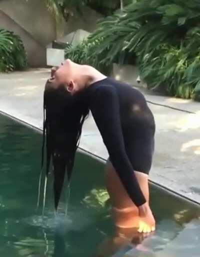 Nina Dobrev sizzles in the water