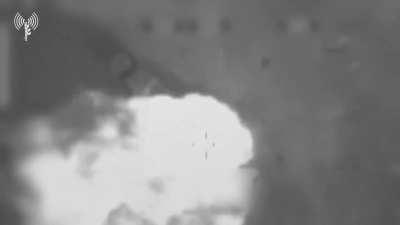 Israeli jet hits an Iranian TEL, causing the loaded ballistic missile to cook off.